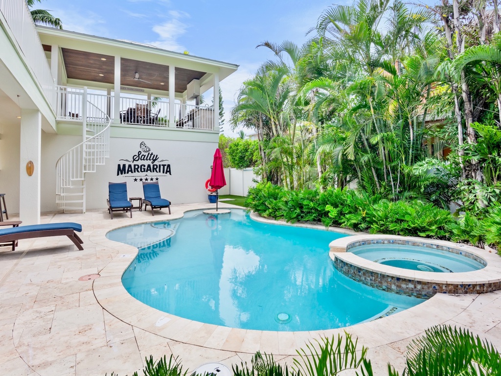 Anna Maria Island pool with red umbrella